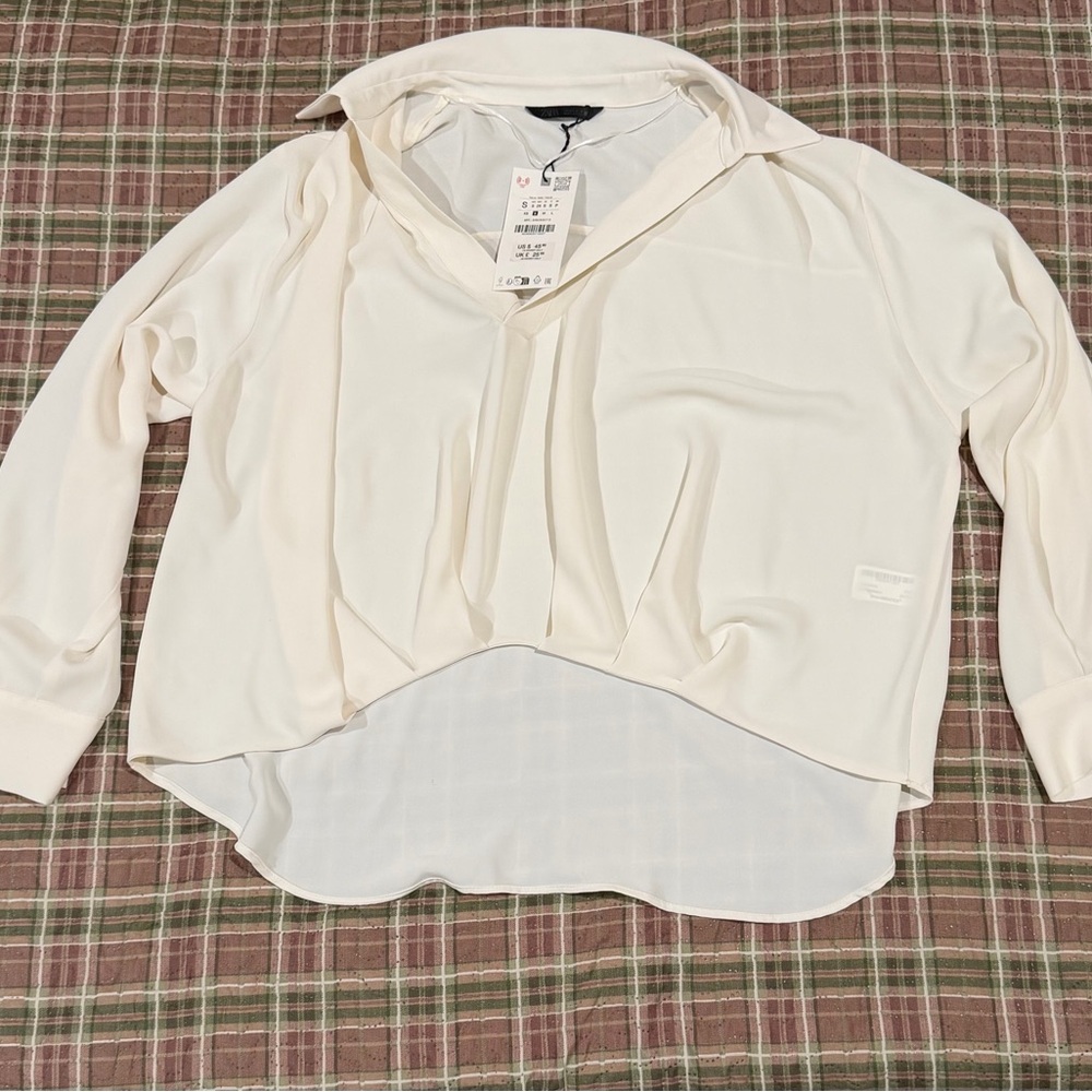 ASYMMETRIC PLEATED HEM SHIRT